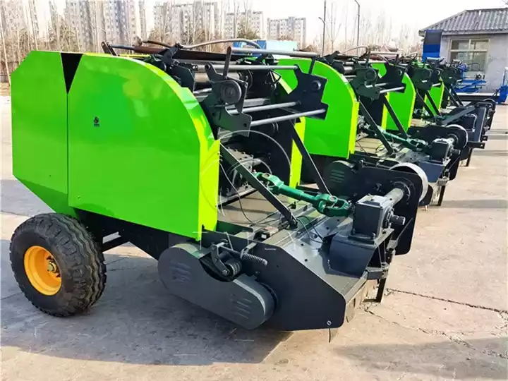 Round-bale straw pickup balers